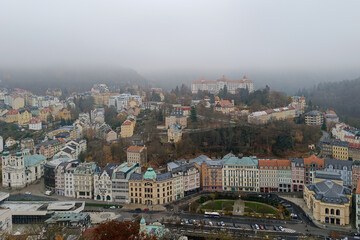 Fototapeta premium Foggy panoramic view of Karlovy Vary city