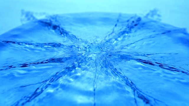 Water Fountain Abstract: A mesmerizing display of water shoots out in an abstract pattern, creating a captivating dance of water and light. Capturing the fluidity and beauty of the water.