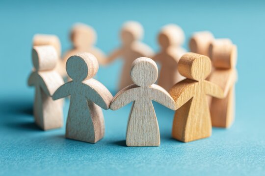 Circle of Unity: A symbolic representation of interconnectedness and support, depicting a circle of diverse wooden figures holding hands, symbolizing community, teamwork.