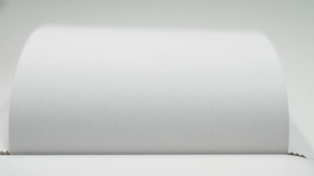 Word TOXIC printed on white paper close-up