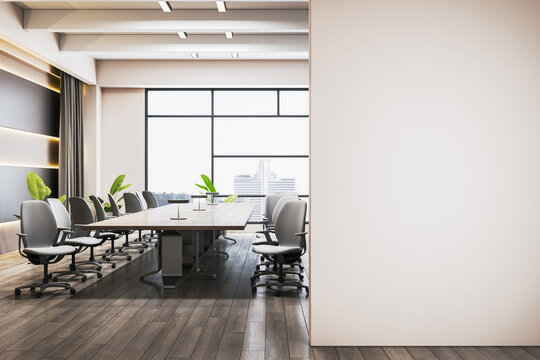 Modern conference room interior featuring long meeting table, ergonomic chairs, bright windows, plants and wide blank wall ideal for clean corporate mockup display. 3D Rendering