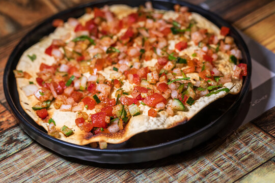Crispy Indian flatbread with refreshing chopped vegetables