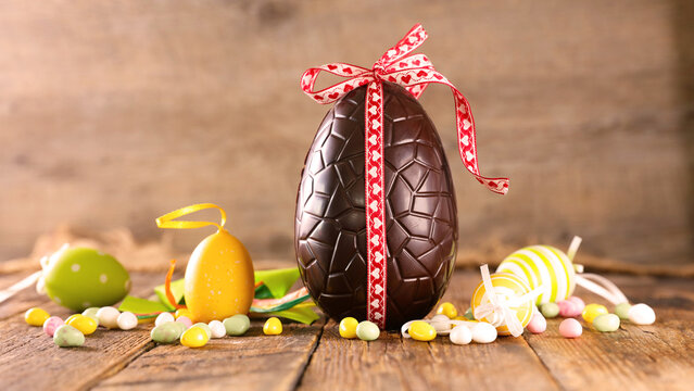 chocolate easter egg with red ribbon