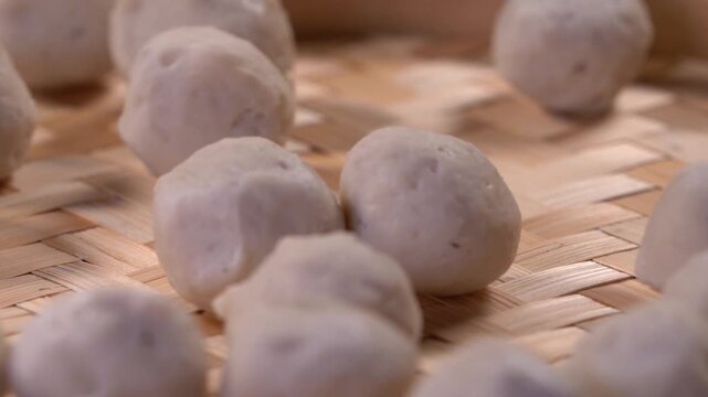 Shantou, Guangdong, China &ndash; 2025-06-12: Close-up footage of handmade Chaoshan hand-beaten fish balls, classic traditional local seafood specialty of eastern Guangdong.
