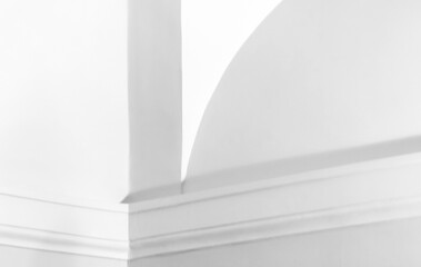 Elegant minimal interior design showcasing a tranquil white wall, abstract classic white architecture background photo © evannovostro