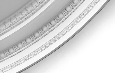 Intricate close-up view of a beaded plaster ceiling molding, abstract architectural background photography © evannovostro