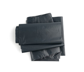 Fototapeta premium Garbage Bag Isolated. Folded Trash Package, New Rolled Plastic Bin Bags, Black Polyethylene Container