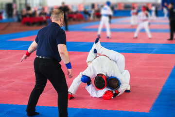 A karate or taekwondo sports competition. © SGr