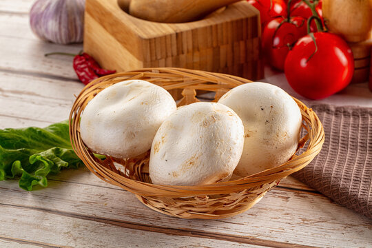 Raw white champignon mush heap