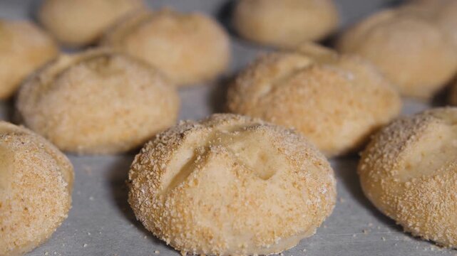 Timelapse close up process of cooking many homemade crunchy oatmeal cookies on metal sheet in oven. Time lapse, dessert, cookery, baking, gastronomy and food concept