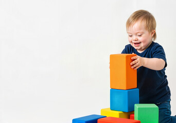 Toddler joyfully stacking colorful building blocks against a white background
