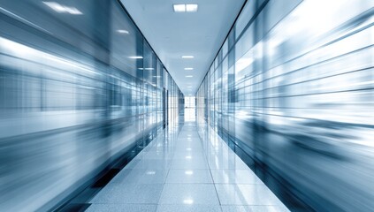 Obraz premium Sleek, modern hallway with glass walls and floor reflection, blurred motion