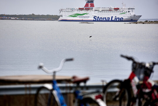 Stena Line ferry Stena Spirit sailing on the Baltic Sea seen behind blurred bicycle handlebars, Karlskrona, Blekinge, Sweden, Europe