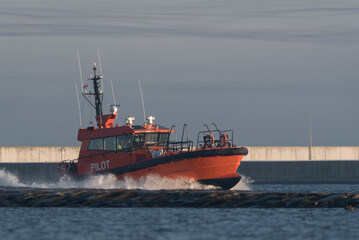 Fototapeta premium MARITIME TRANSPORT - The pilot boat heads out to sea