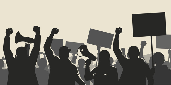 Protesters raise fists and signs in a crowd demonstration scene outside.