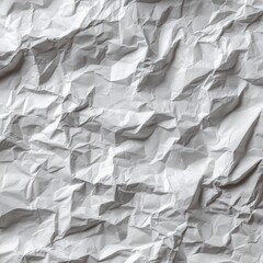 Fototapeta premium Close-up of crumpled white paper, revealing a complex network of creases and shadows