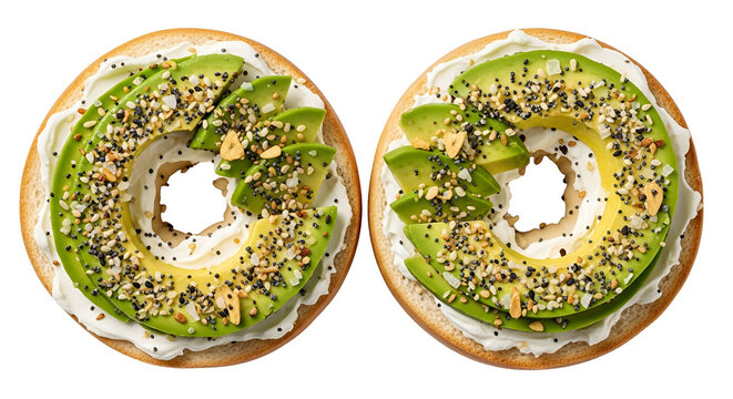 Two bagels with avocado and sesame.