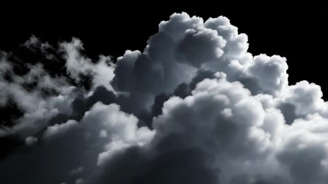 A powerful image of billowing clouds against a dark backdrop evokes a sense of awe and potential, perfect for marketing campaigns needing depth and im