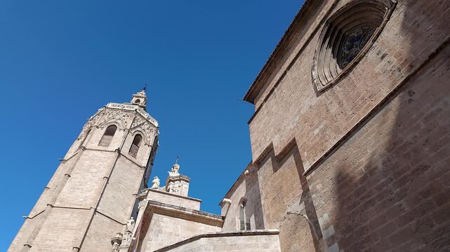 Torre del Miguelete rising to the sky next to the Gothic cathedral of Valencia, Spain.