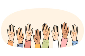 Obraz premium World religions day is celebrated by multiracial people by raising palms up as sign of unity and friendship. Christians and buddhists or muslims call for cooperation between different religions