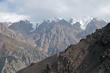 Majestic high altitude landscape of Talgar peak and snow capped Tian Shan mountains in September