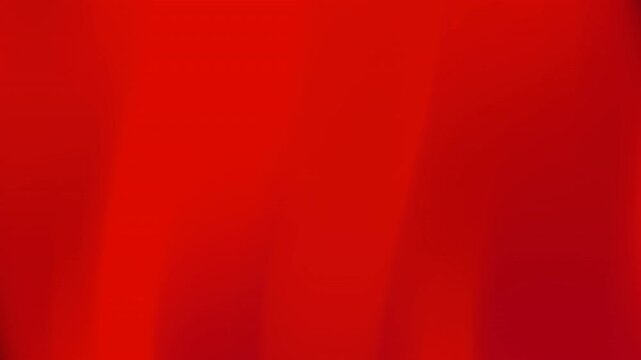 Suitable for backgrounds, banners, social media posts, and graphic design projects requiring a bold and striking red color palette.