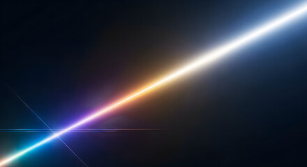 Diagonal rainbow light beam shining through dark space with lens flare effect