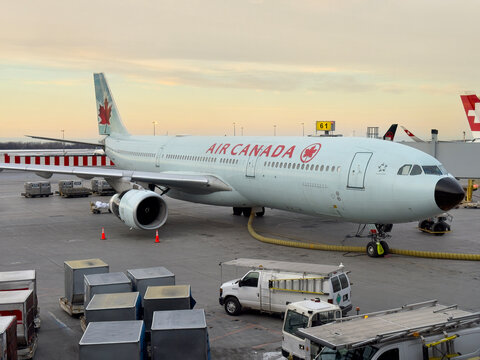 Air Canada Airbus A330 at the gate of the YUL Montr&eacute;al-Pierre Elliott Trudeau International Airport