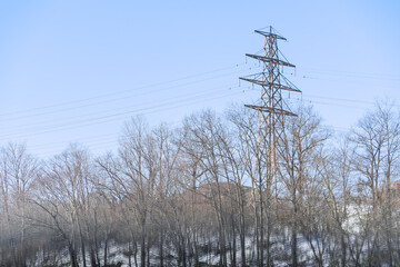 Naklejka premium Electricity pylon in a winter landscape, Toronto, Canada