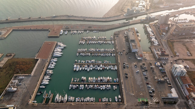 Aerial view of a lively marina in Italy