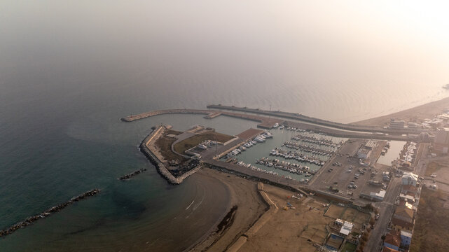 Aerial view of marina and beach in Cingoli, Italy