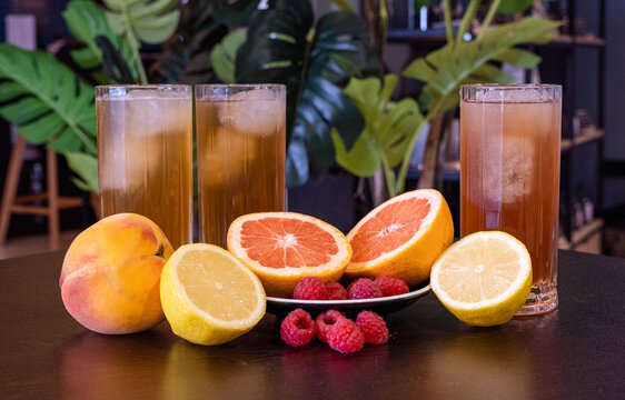 Refreshing iced tea with citrus and berries