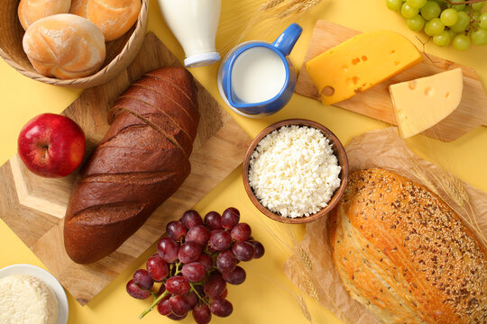 Shavuot holiday table with bread and dairy products