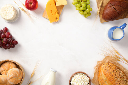 Dairy foods and fruits arranged for Shavuot celebration