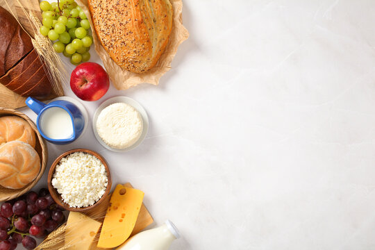 Traditional Shavuot dairy meal with bread and fruits