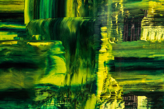 Abstract acrylic painting with vibrant green hues