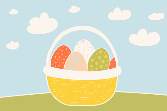 Colorful easter eggs in a basket under fluffy clouds