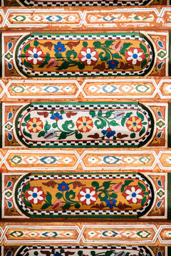 Moroccan ceiling art with geometric patterns and colors