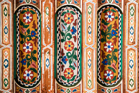 Moroccan ceiling art with geometric patterns and colors