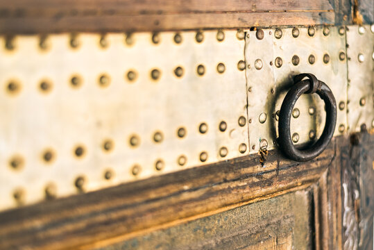 Detail of an ornate wood door in Marrakech, Morocco