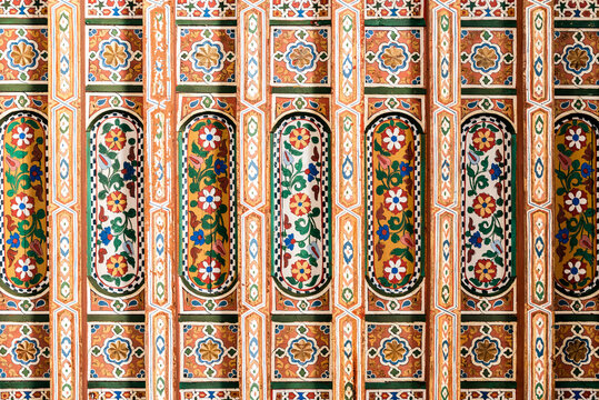 Geometric ceiling art in Marrakech with vibrant colors