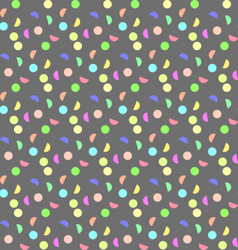 Seamless texture of colorful festive confetti on a gray background