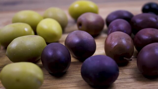Various varieties of fermented olives (Olea europaea), with a glossy texture after the bitterness has been removed
