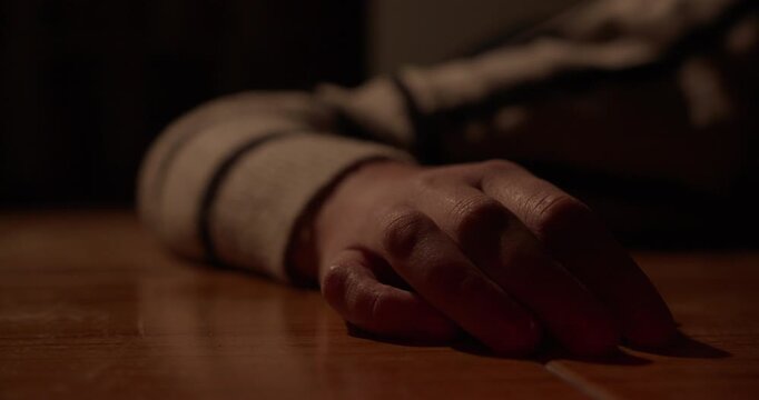 Close up of a body in a crime scene at home