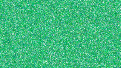 Fototapeta premium A vibrant green digital background featuring a dense and fine uniform static noise grain pattern