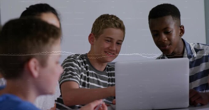 Students nodding toward laptop typing and working on education assignment writing in notebook