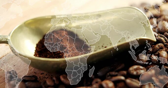 Starting close-up, brass coffee scoop holding grounds showing global coffee origin with map overlay