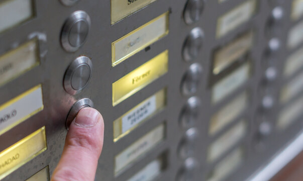 Beware of dubious door-to-door transactions on a doorbell system symbol image