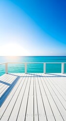 Fototapeta premium White wooden deck overlooking the turquoise tropical ocean under clear blue sky