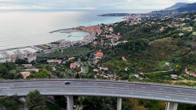 Aerial view of highway viaduct and menton french riviera coastline